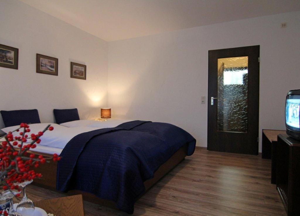 Hotel Haus Ammerland Бад Цвишенан Стая снимка